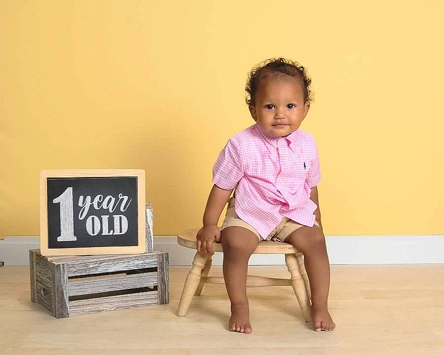 Cartier joined the competition — help win amazing prizes! baby, baby_toddler_clothing, barefoot, comfort, elbow, flooring, foot, happy, hardwood, human_leg, knee, magenta, neck, person, rectangle, sitting, sleeve, t_shirt, thigh, toddler