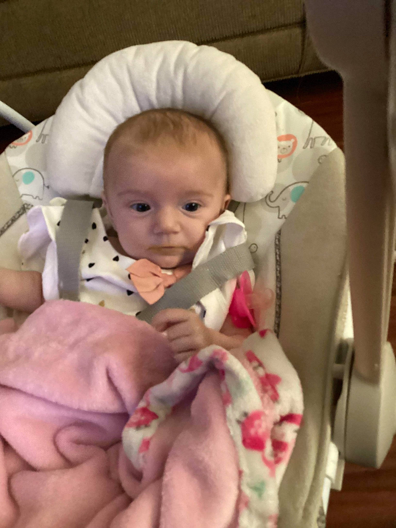 Colleen is registered to the contest to win money with this photo: abdomen, baby, baby_in_car_seat, baby_products, baby_safety, baby_toddler_clothing, carmine, cheek, child, comfort, finger, head, leg, linens, mouth, person, room, skin, textile, thumb