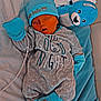 Sören participe au concours pour gagner de l'argent avec cette photo : newborn, baby, sleeping, blue_clothing, mittens, socks, hat, teddy_bear, bed, blanket, soft_toy, infant, cute, peaceful, indoors, closeup, resting, cozy, child, portrait