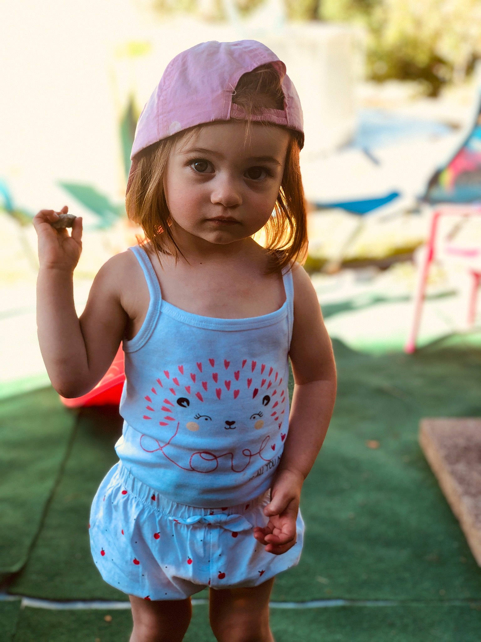Kiara a rejoint le concours — aidez-le/la à gagner de superbes lots ! baby_toddler_clothing, cap, cool, electric_blue, face, fun, grass, hairstyle, happy, headwear, leisure, people_in_nature, person, pink, recreation, shoulder, skin, sleeve, street_fashion, summer