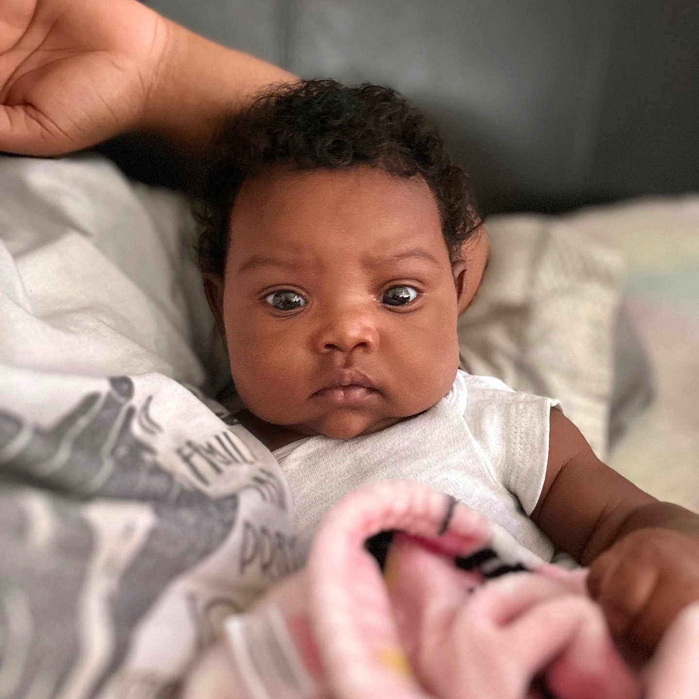 Ariyah is registered to the contest to win money with this photo: baby, bed, bedroom, blanket, bodypart, clothing, couch, face, finger, furniture, hand, happy, head, newborn, person, photography, portrait, quilt, smile, t_shirt