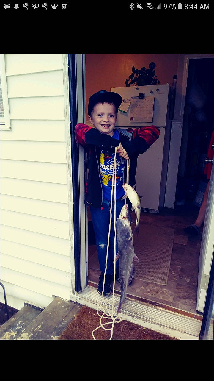 Kyle is registered to the contest to win money with this photo: child, crutch, electric_blue, joy, person, square, standing