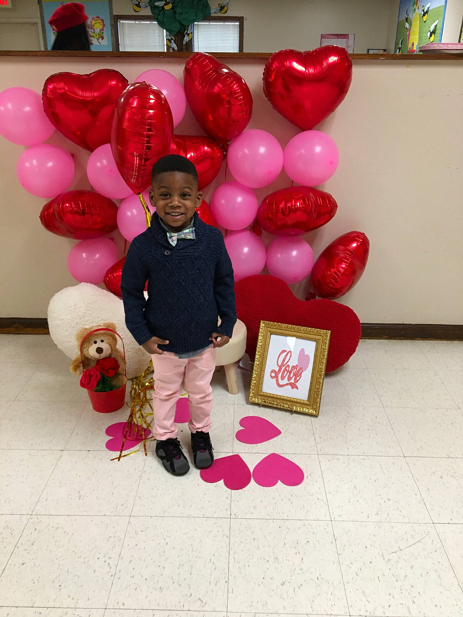 Gary is registered to the contest to win money with this photo: architecture, balloon, child, event, fun, heart, joy, love, magenta, party, party_supply, person, pink, toy, valentines_day