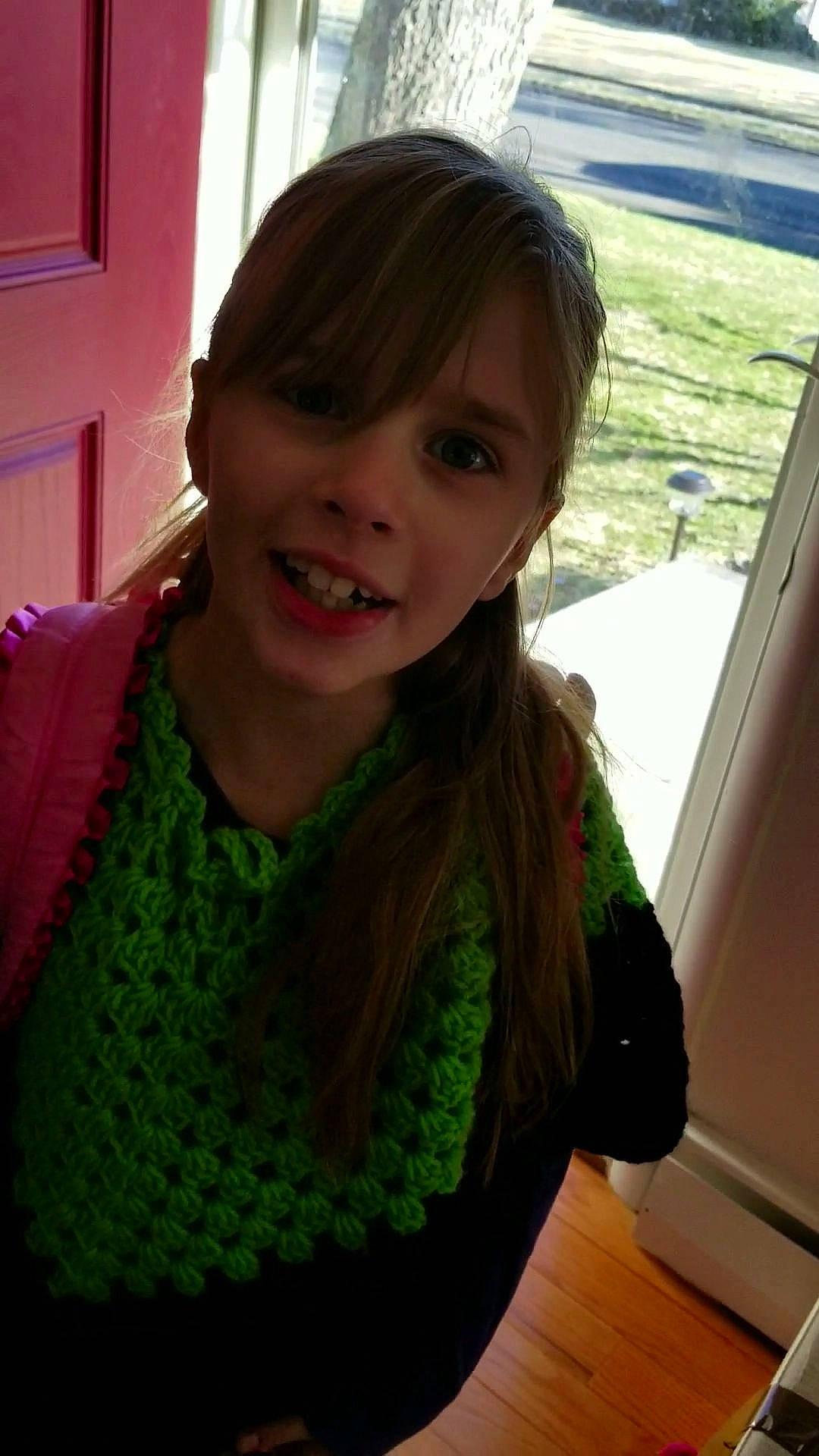 Lea is registered to the contest to win money with this photo: bangs, black_hair, brown_hair, hair, hair_coloring, hairstyle, joy, knitting, long_hair, neck, outerwear, person, smile, sweater, tooth, wool