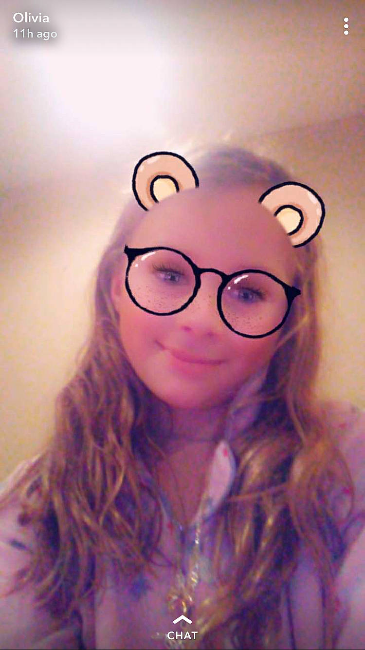 Olivia is registered to the contest to win money with this photo: brown_hair, cool, eyewear, face, glasses, hair, hairstyle, lip, long_hair, person, selfie, smile, vision_care