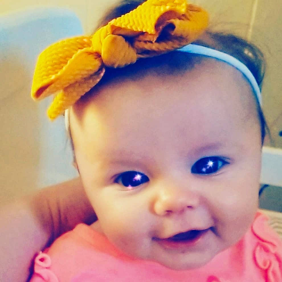 Emily Rose is registered to the contest to win money with this photo: baby, baby_making_funny_faces, cheek, child, ear, eye, face, fashion_accessory, forehead, hair_accessory, happy, head, headband, headgear, headpiece, lip, person, skin, smile, toddler