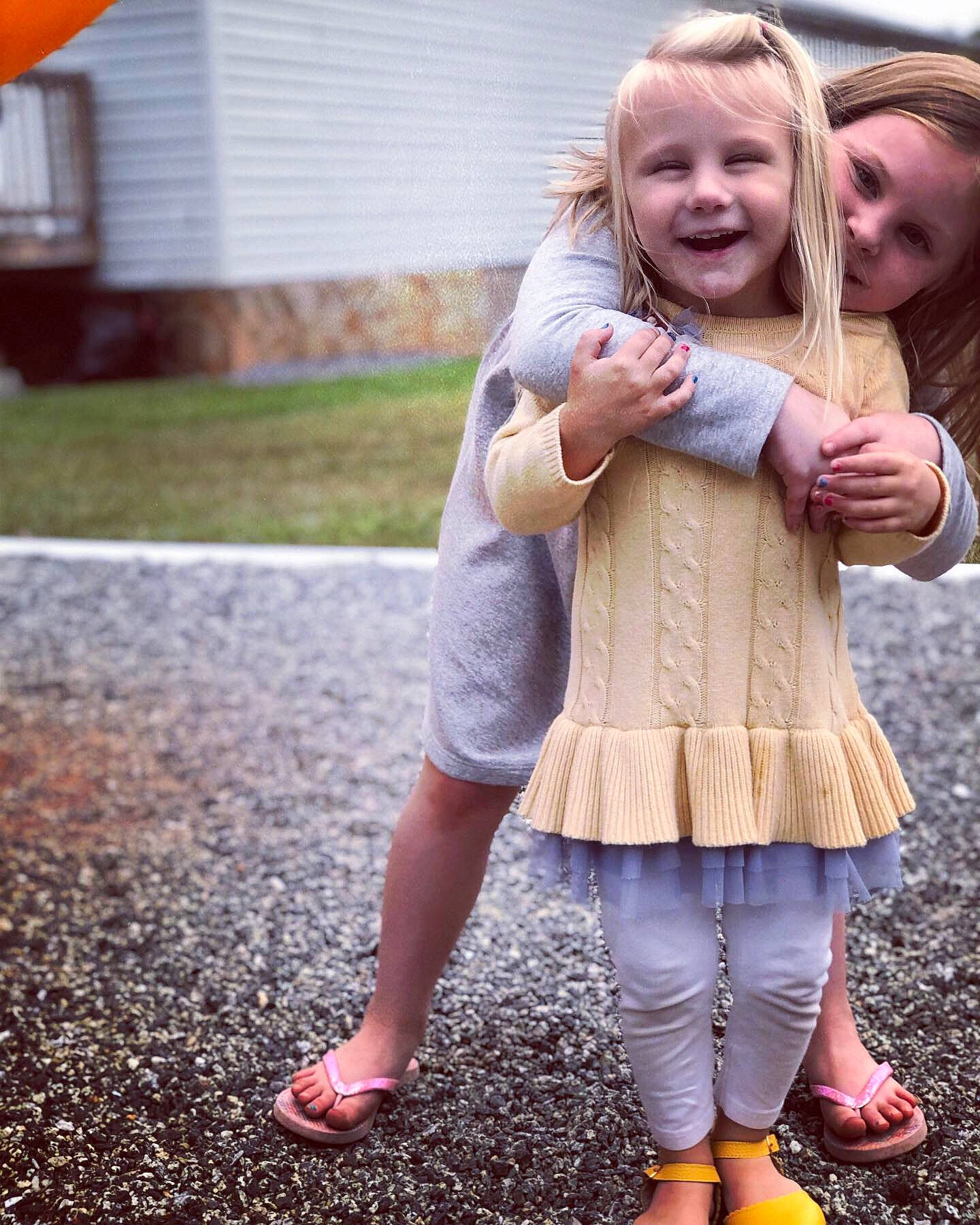 Mailynn joined the competition — help win amazing prizes! blond, child, child_model, facial_expression, finger, footwear, fun, gesture, grass, happy, jacket, joy, laugh, outerwear, person, play, smile, snapshot, standing, toddler