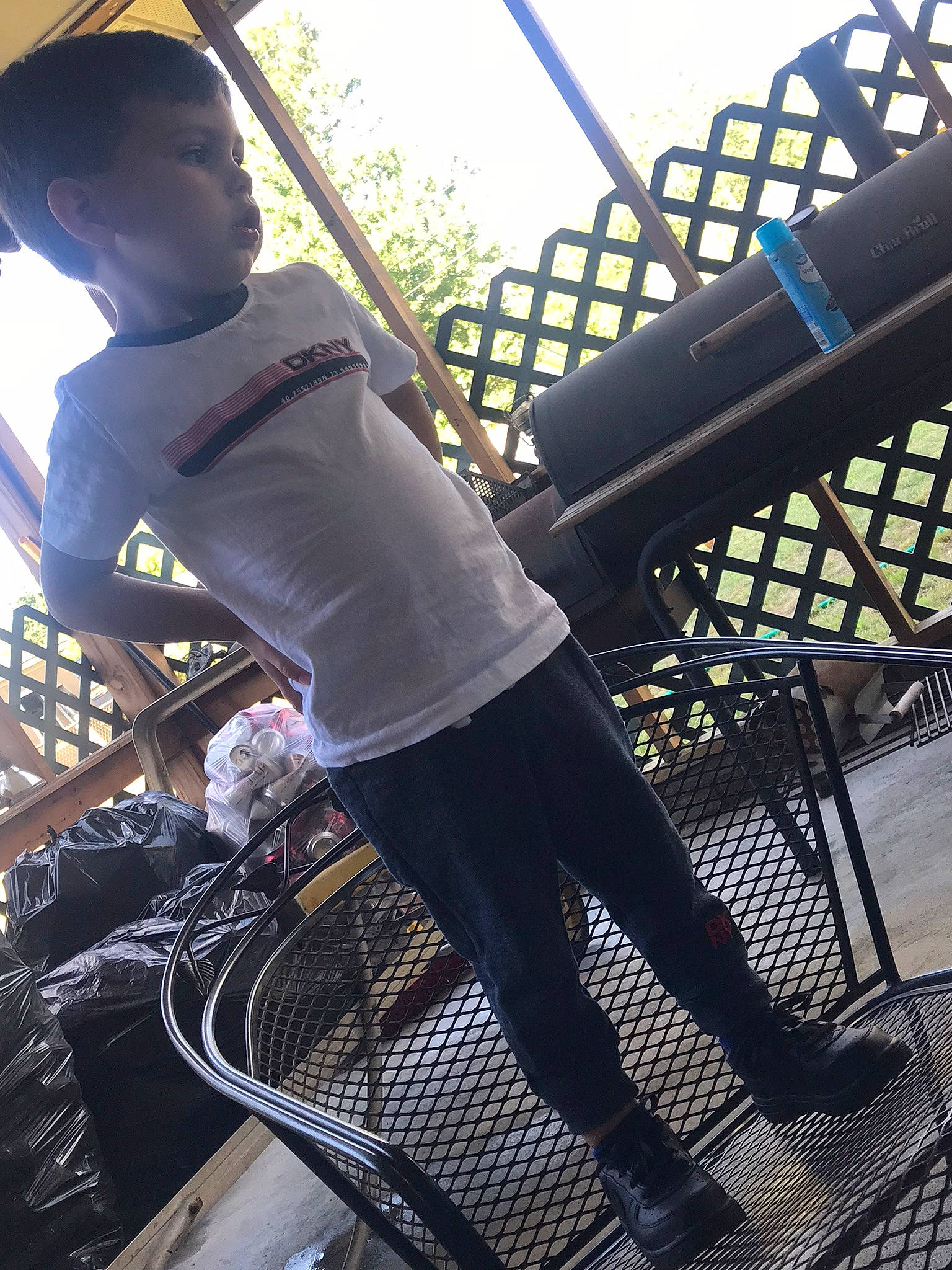 Easton is registered to the contest to win money with this photo: baseball_cap, cap, electric_blue, eyewear, foot, human_body, human_leg, knee, leg, leisure, metal, musician, person, photograph, recreation, shoe, standing, street_fashion, t_shirt, thigh