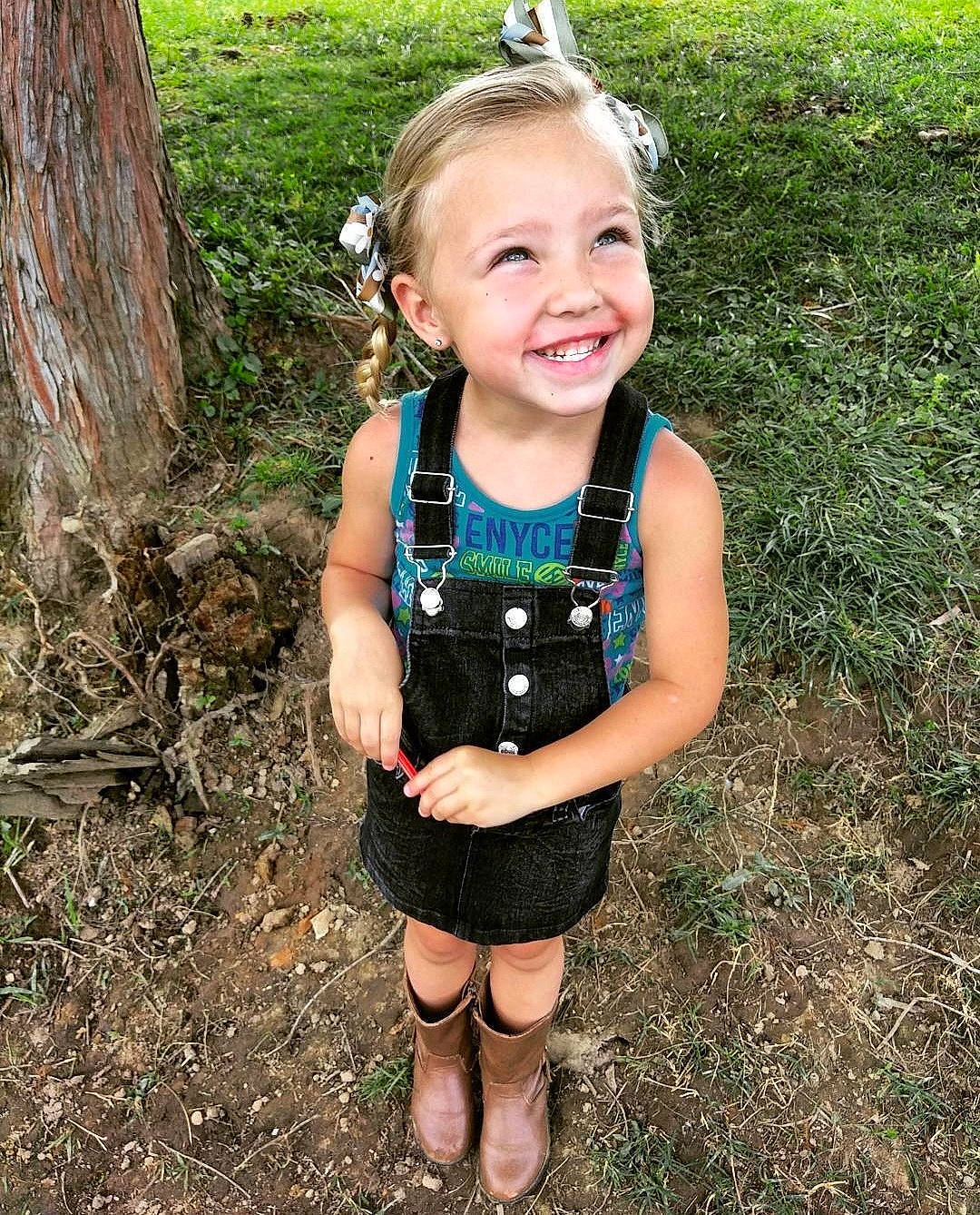 Brailie Kay joined the competition — help win amazing prizes! baby_toddler_clothing, cool, electric_blue, eye, fun, grass, happy, head, iris, joy, leisure, people_in_nature, person, personal_protective_equipment, plant, recreation, smile, standing, t_shirt, thigh