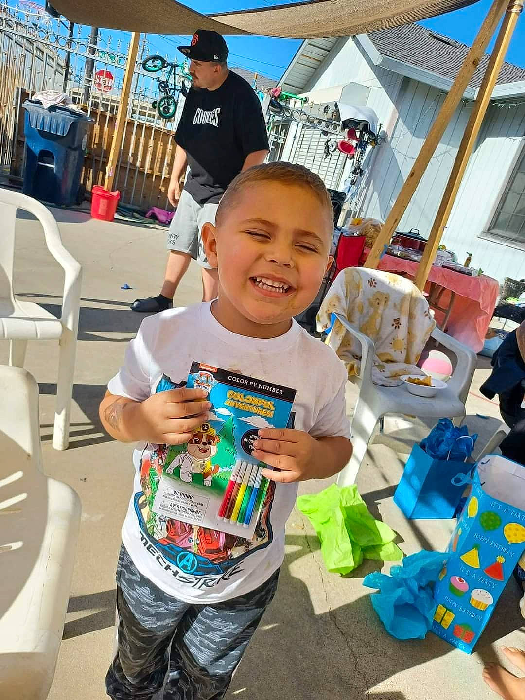 Anthony is registered to the contest to win money with this photo: child, event, fun, happy, hat, headwear, joy, leisure, party, people, person, plastic, public_space, recreation, shorts, sky, smile, summer, t_shirt, toddler