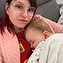 Alexane participe au concours pour gagner de l'argent avec cette photo : baby, blanket, casual_clothing, child, comfort, couch, cozy, furniture, glasses, home, indoor, kitchen, nap, person, portrait, relaxation, sleeping, soft_texture, woman, young_adult