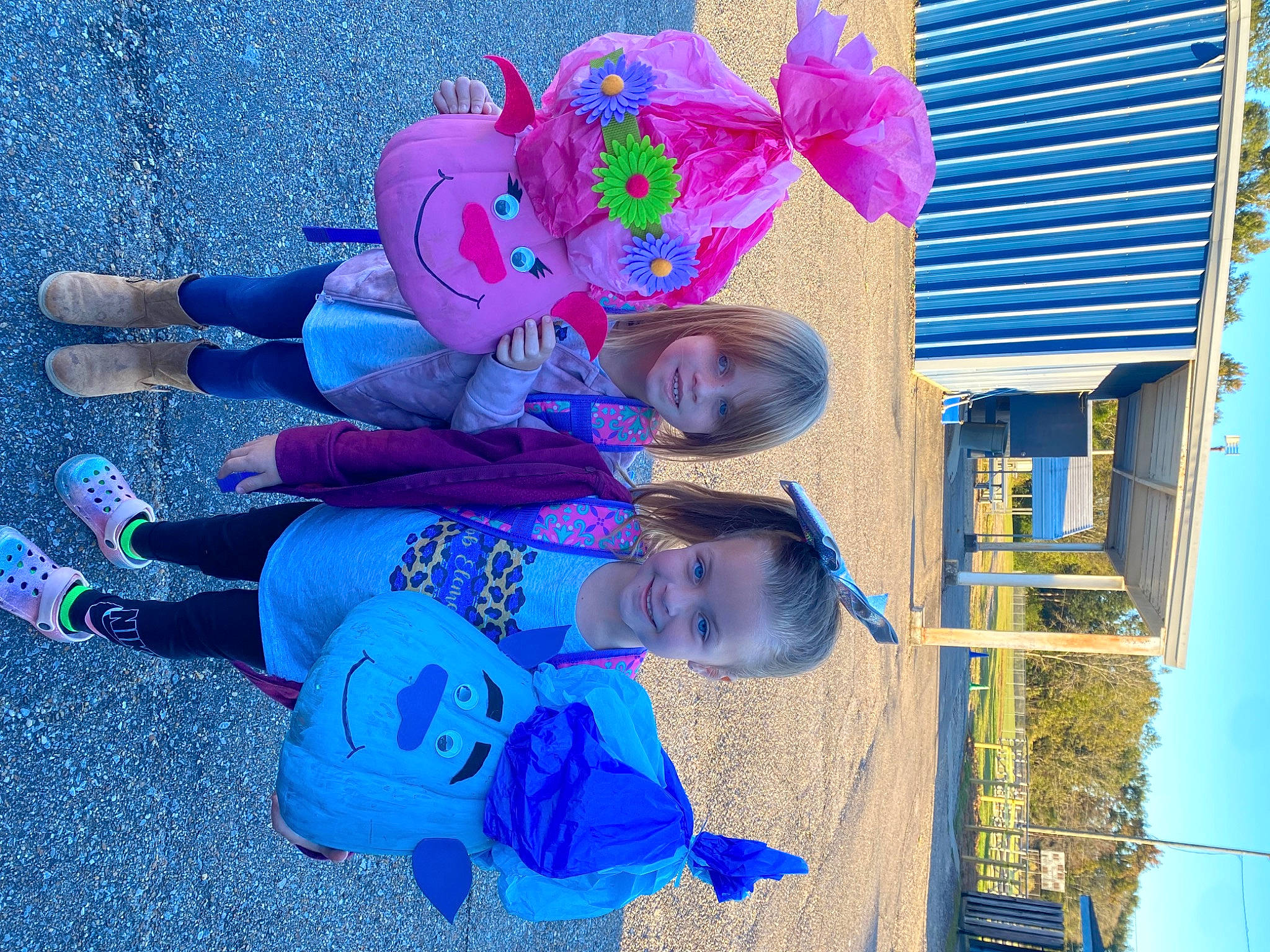 Charlie And Sawyer is registered to the contest to win money with this photo: azure, blue, building, child, electric_blue, event, fun, happy, house, joy, leisure, magenta, person, petal, purple, red, sky, smile, toddler, tree