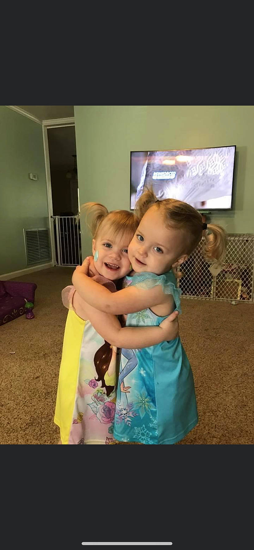 Charlie And Sawyer is registered to the contest to win money with this photo: baby, bench, chair, child, display_device, event, flash_photography, flooring, formal_wear, fun, happy, home_appliance, joy, led_backlit_lcd_display, living_room, person, room, sitting, t_shirt, television