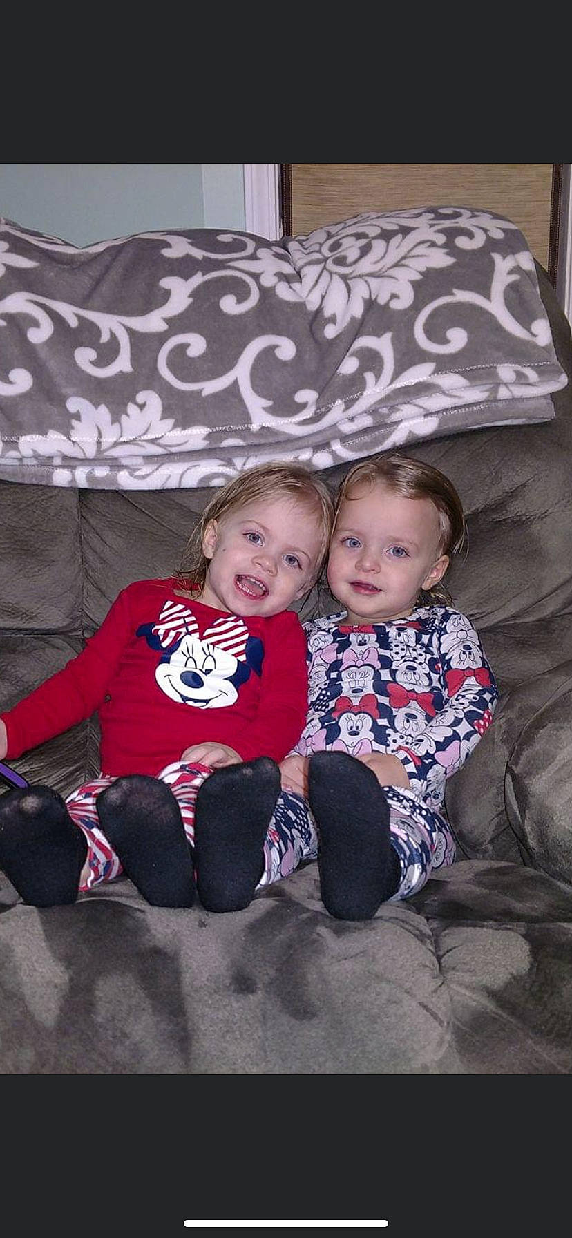 Charlie And Sawyer is registered to the contest to win money with this photo: baby, baby_toddler_clothing, child, comfort, couch, eye, face, flash_photography, fun, happy, head, joy, lap, linens, pattern, person, pink, sitting, sleeve, smile