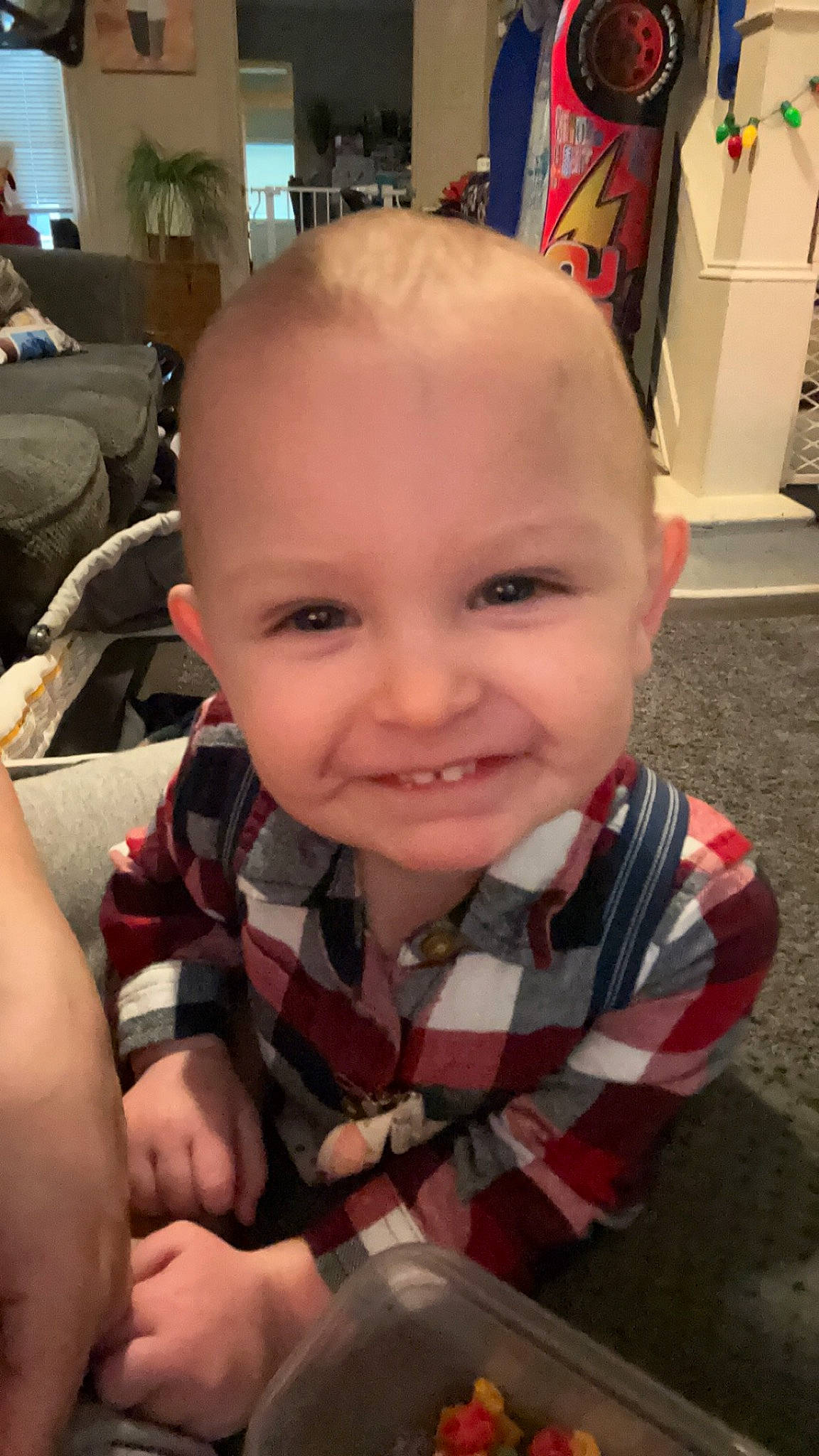 Micah is registered to the contest to win money with this photo: baby, chair, cheek, child, ear, eyebrow, finger, flooring, forehead, fun, happy, iris, jaw, joy, mouth, nose, person, sitting, skin, smile