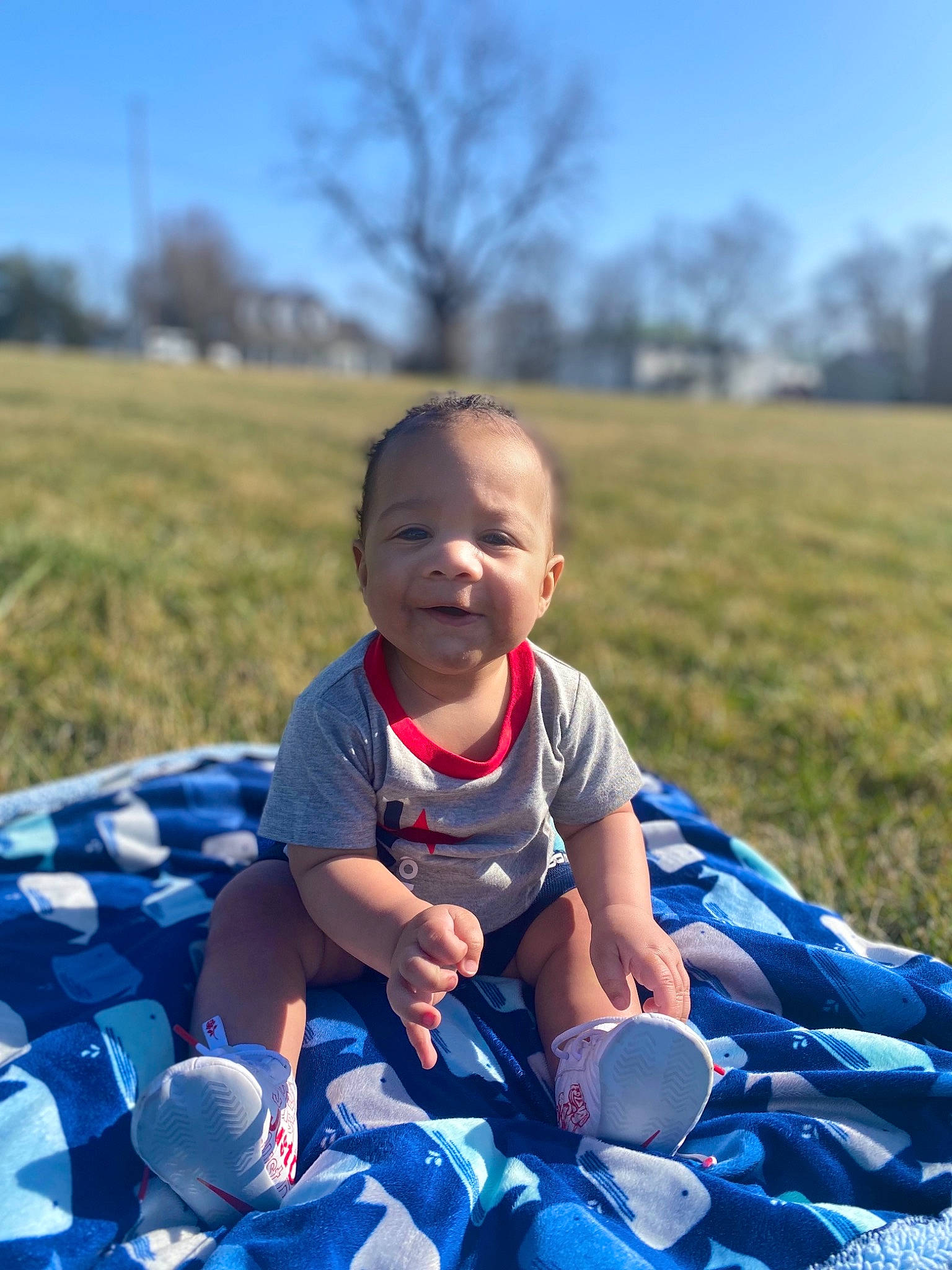 Alijah joined the competition — help win amazing prizes! azure, baby, baby_toddler_clothing, blue, child, fun, grass, grassland, happy, leisure, natural_environment, nature, people, people_in_nature, person, recreation, sky, summer, sunlight, toddler