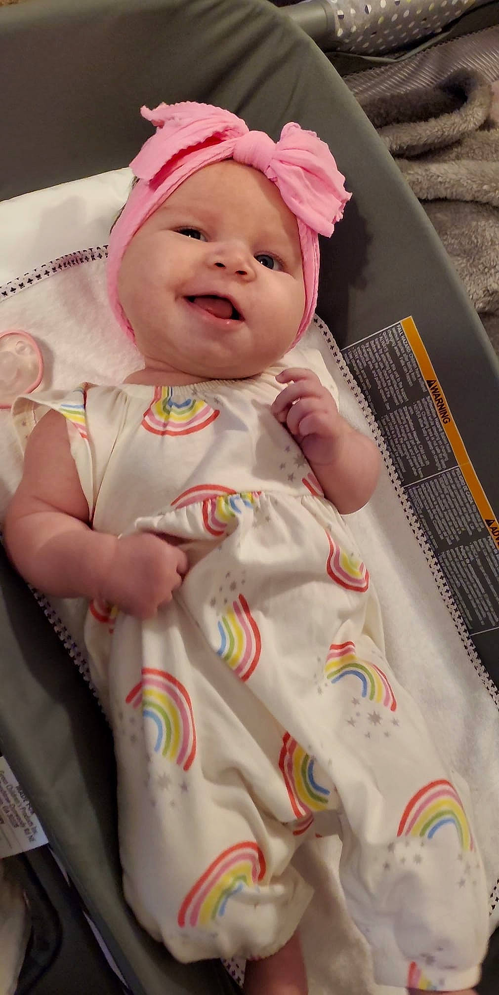 Kaylee joined the competition — help win amazing prizes! baby, baby_laughing, baby_toddler_clothing, beauty, cap, cheek, child, dress, face, facial_expression, happy, headgear, headwear, lip, person, pink, product, skin, sleeve, smile