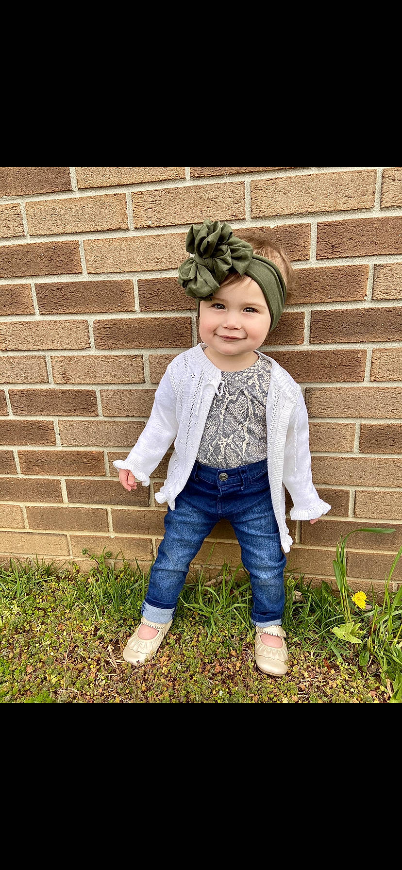 Lakelyn is registered to the contest to win money with this photo: brick, child, child_model, cool, denim, fashion_accessory, footwear, grass, headgear, headwear, jacket, jeans, joy, outerwear, pattern, person, photograph, shoe, sitting, smile