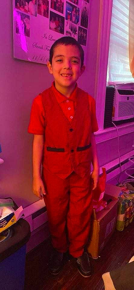 Ezekiel is registered to the contest to win money with this photo: belt, child, cool, curtain, electric_blue, event, fun, happy, joy, magenta, person, pink, purple, red, room, sleeve, smile, standing, t_shirt, toddler