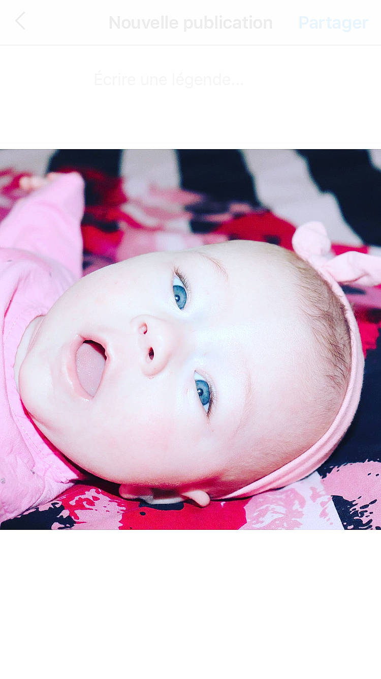 Romanne participe au concours pour gagner de l'argent avec cette photo : baby, baby_toddler_clothing, cheek, child, collar, eye, eyebrow, eyelash, fashion_accessory, hair, happy, head, iris, lip, magenta, nose, pattern, person, pink, sleeve