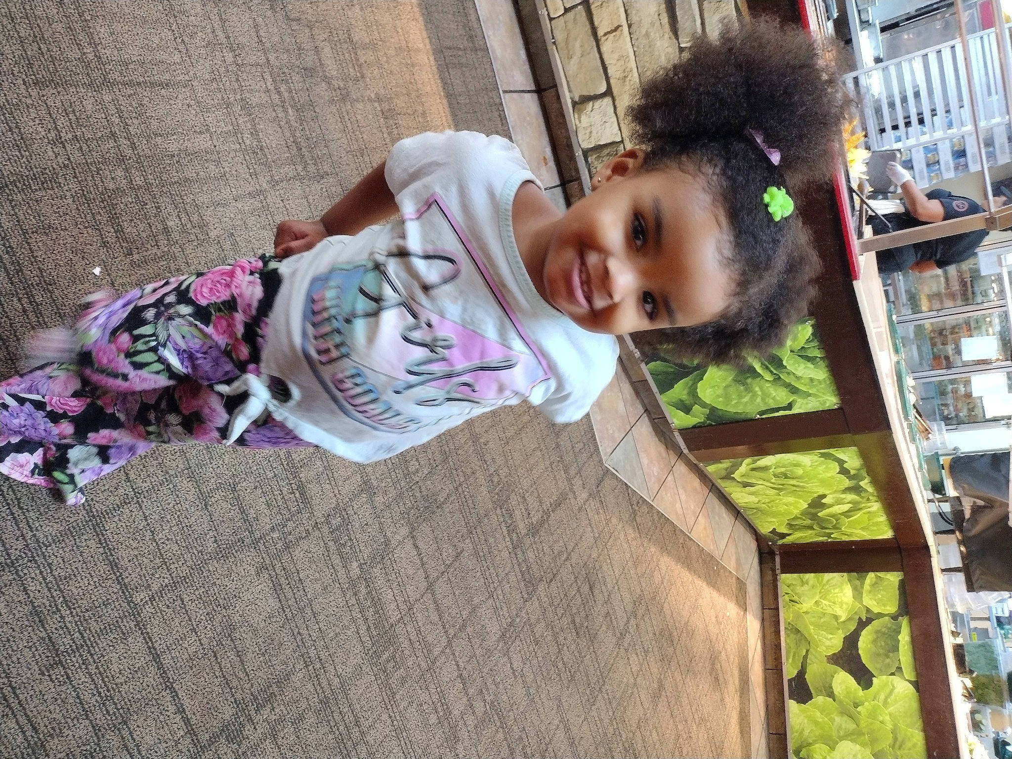 Lundyn is registered to the contest to win money with this photo: baby, child, city, fun, fur, grass, happy, house, joy, leisure, magenta, pattern, person, pink, plant, sitting, smile, street, toddler, tree