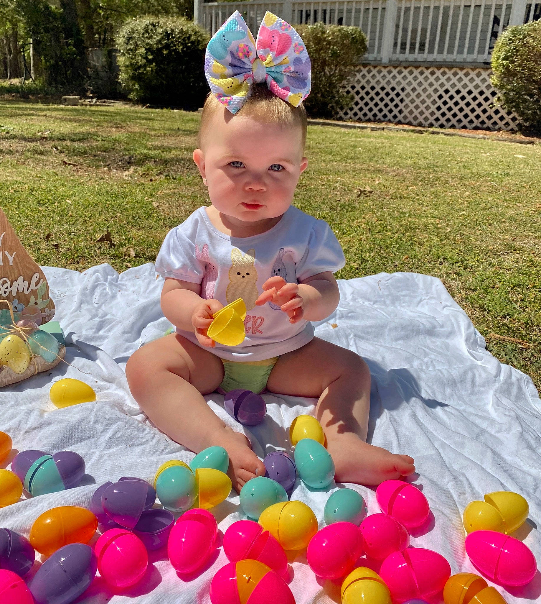 River joined the competition — help win amazing prizes! baby, baby_toddler_clothing, child, costume_hat, event, fun, grass, happy, hat, leisure, party, party_supply, person, plant, product, recreation, sitting, summer, sweetness, toddler