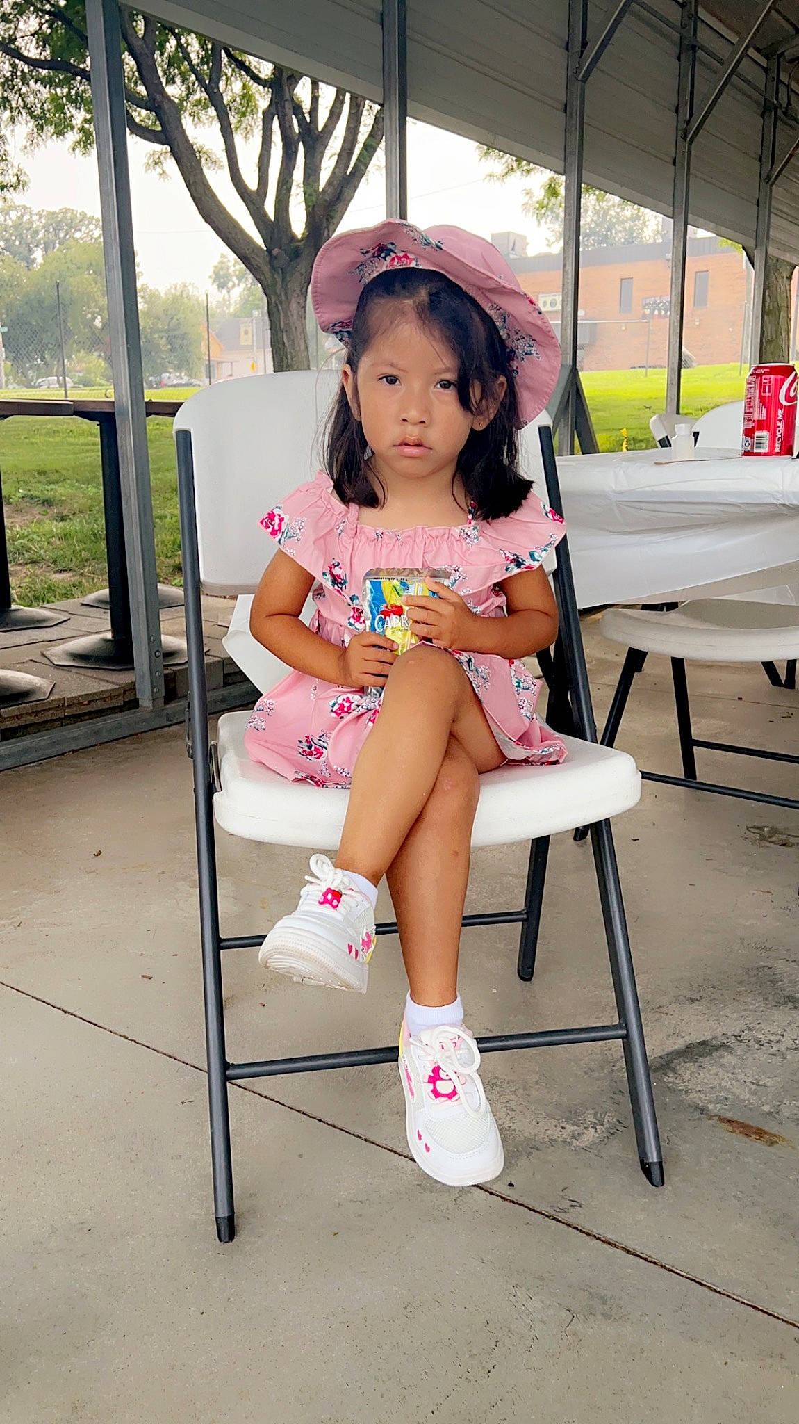 Aileen joined the competition — help win amazing prizes! bangs, child, foot, fun, hat, head, human_leg, knee, leg, leisure, magenta, person, pink, plant, recreation, shoe, sitting, sun_hat, thigh, tree