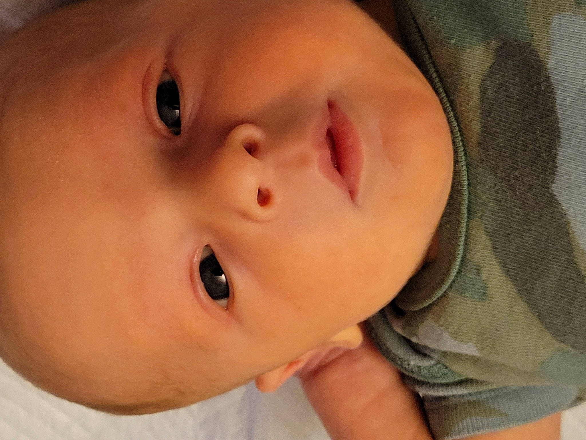 Tyr is registered to the contest to win money with this photo: baby, baby_toddler_clothing, cheek, child, chin, comfort, eye, eyebrow, eyelash, face, facial_expression, forehead, gesture, iris, lip, mouth, nose, person, skin, sleeve