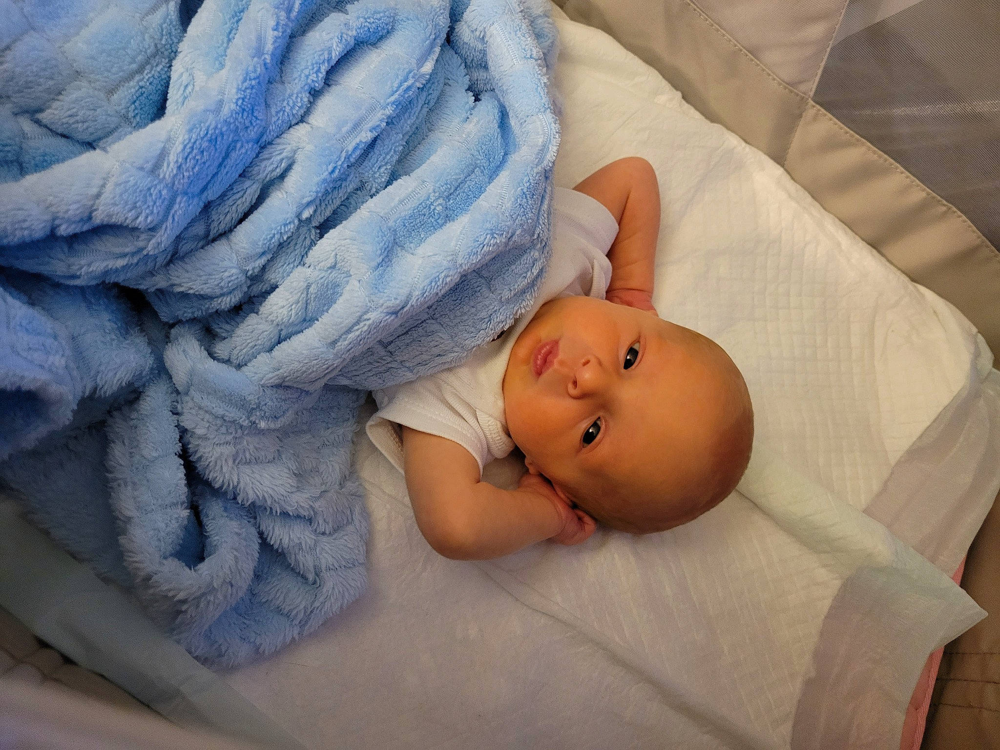 Tyr is registered to the contest to win money with this photo: baby, baby_products, baby_safety, baby_sleeping, baby_toddler_clothing, bed, bed_sheet, bedding, bedtime, child, comfort, eye, face, head, human_body, linens, person, room, skin, sleeve