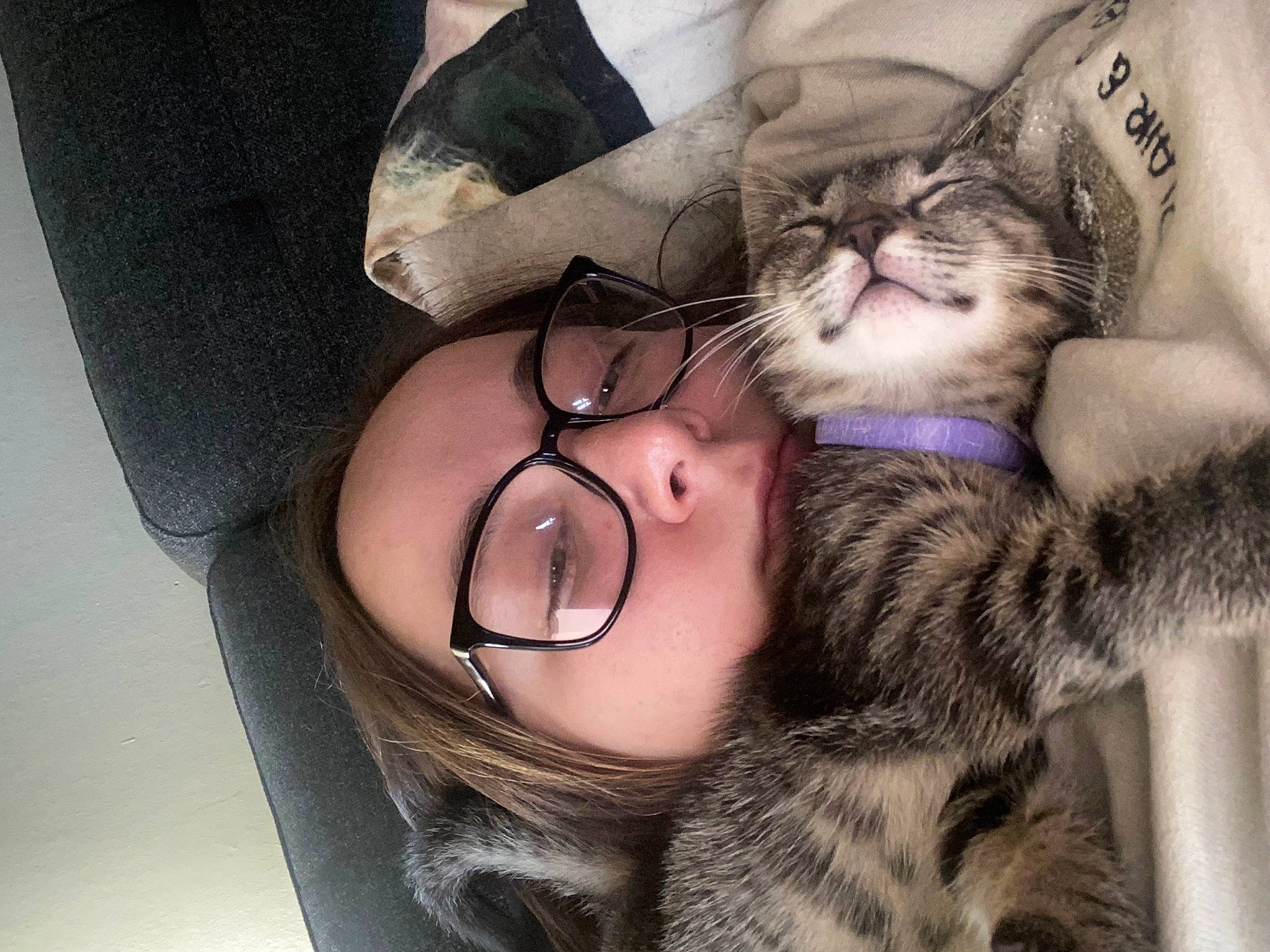 Milo is registered to the contest to win money with this photo: carnivore, cat, comfort, domestic_short_haired_cat, ear, eye, eyewear, felidae, fur, gesture, glasses, happy, lap, nail, selfie, skin, small_to_medium_sized_cats, sunglasses, vision_care, whiskers