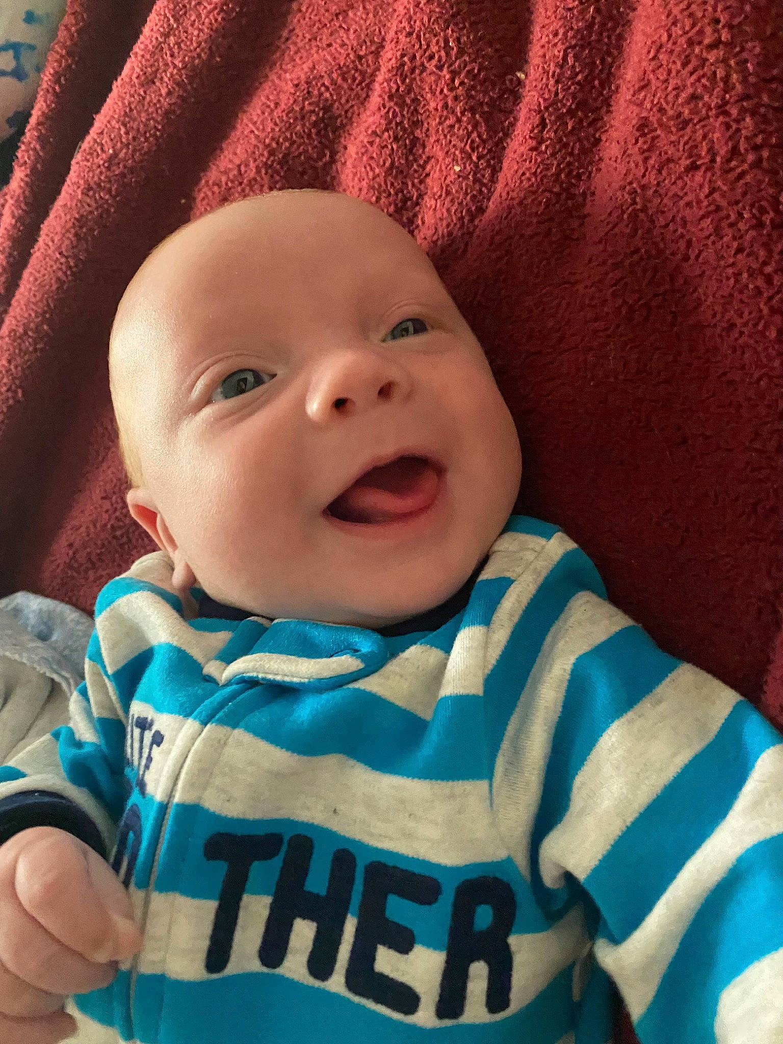 Bentley is registered to the contest to win money with this photo: baby, baby_toddler_clothing, cheek, chin, comfort, eye, eyebrow, face, happy, head, iris, lip, mouth, nose, person, skin, sleeve, smile, standing, textile