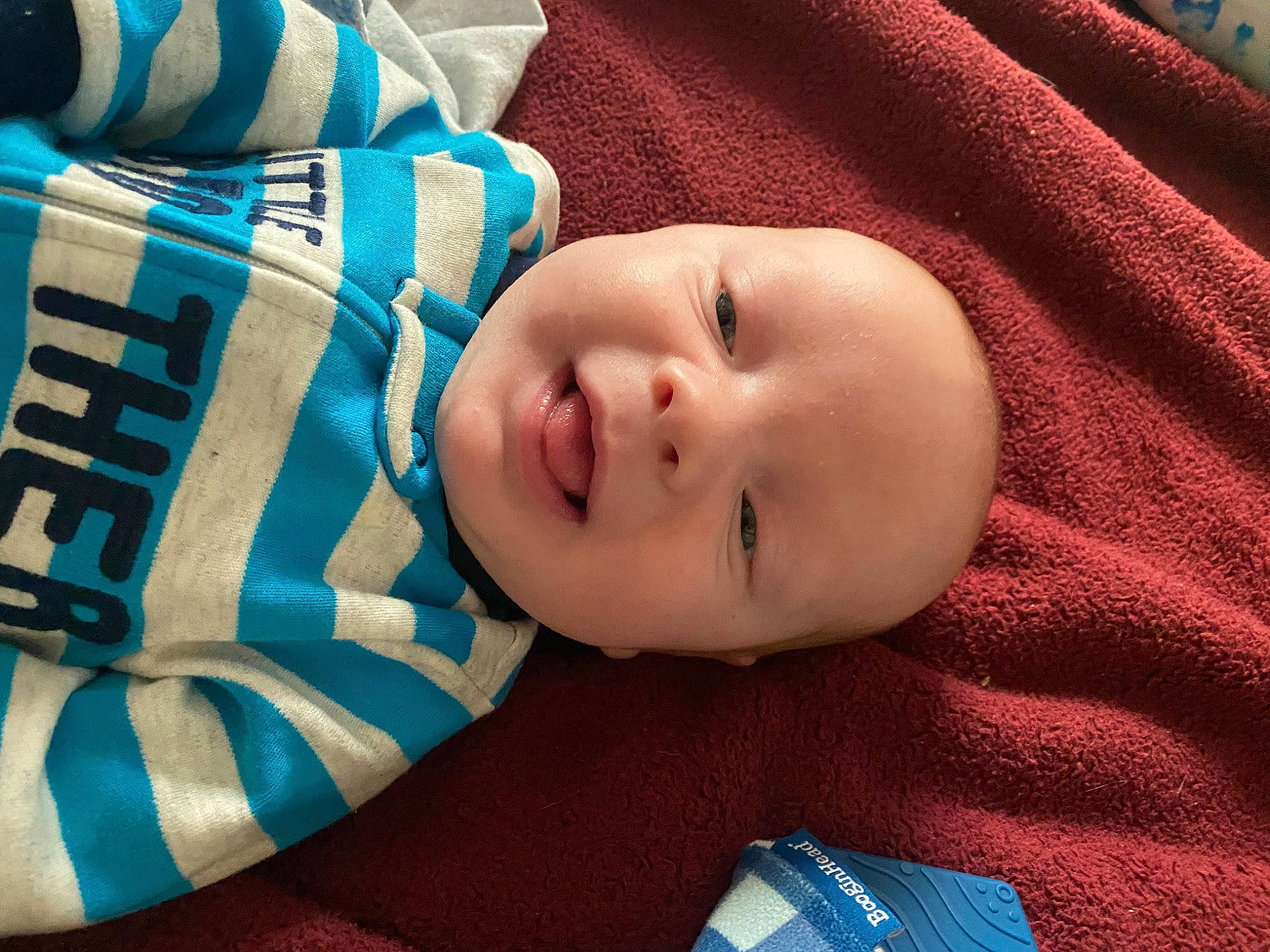 Bentley joined the competition — help win amazing prizes! baby, baby_toddler_clothing, blue, cheek, child, comfort, electric_blue, happy, linens, pattern, person, portrait_photography, room, sleeve, smile, toddler