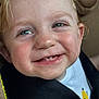 toddler, child, smile, face, blue_eyes, teeth, car_seat, white_shirt, banana_print, hair, skin, close_up, happy, infant, seatbelt, seat, cute, young_child, portrait, baby