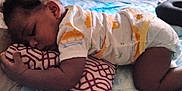 Amir joined the competition — help win amazing prizes! baby, bed, blue, child, clothing, cute, indoor, infant, onesie, orange, pattern, peaceful, person, pillow, resting, sleep, sleeping, soft, toddler, white