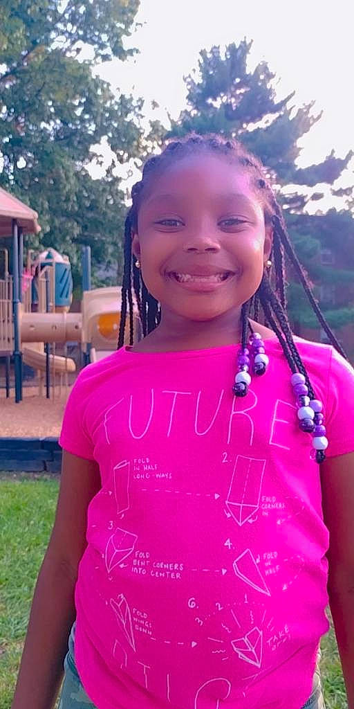 Wynter is registered to the contest to win money with this photo: child, cool, electric_blue, event, facial_expression, fun, grass, handwriting, happy, head, jewellery, joy, leisure, magenta, person, pink, plant, recreation, smile, t_shirt