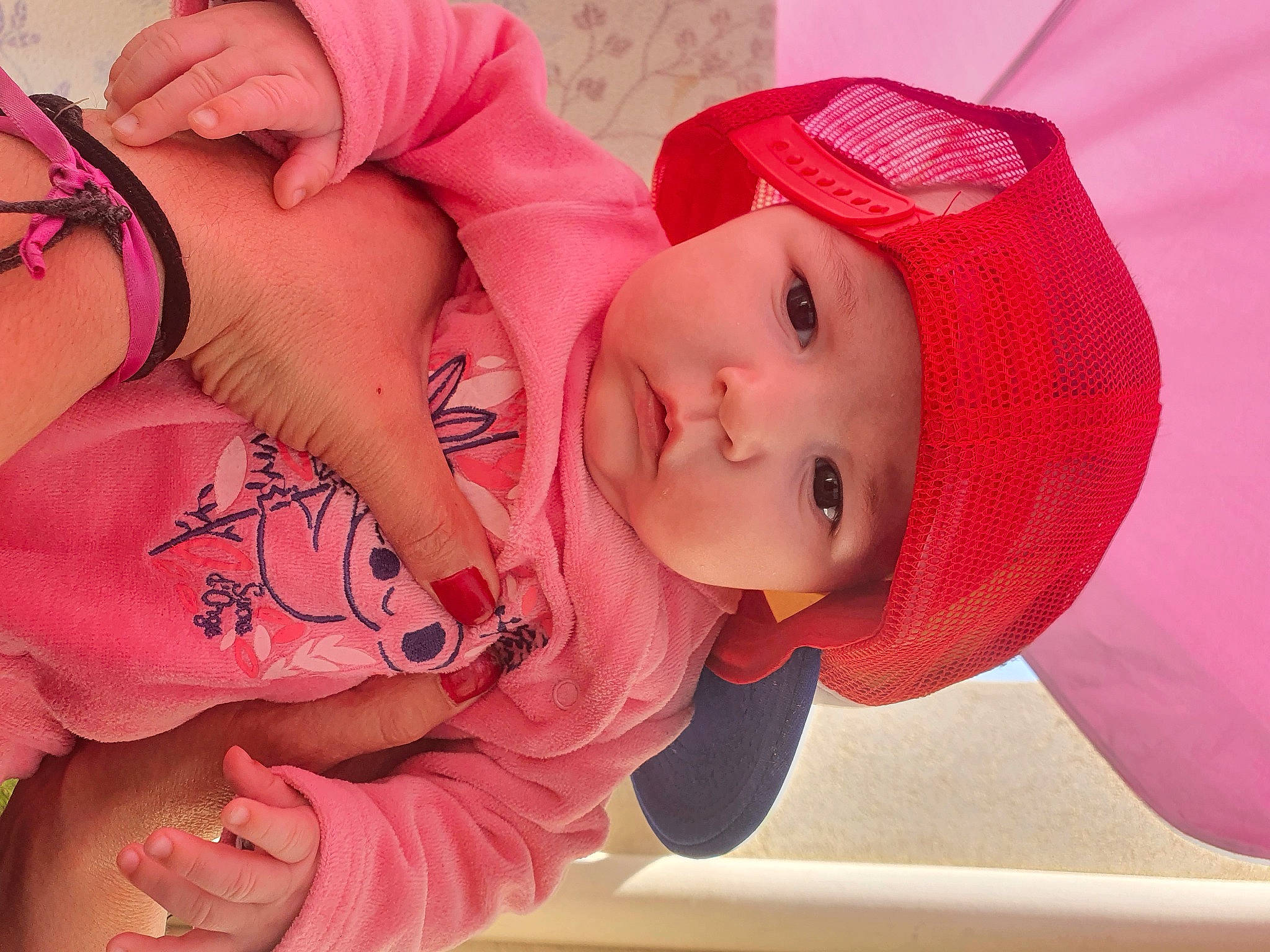 Lauryn participe au concours pour gagner de l'argent avec cette photo : baby, baby_toddler_clothing, cap, chest, child, design, eyelash, fun, happy, hat, head, headwear, lip, magenta, mouth, pattern, person, pink, skin, smile
