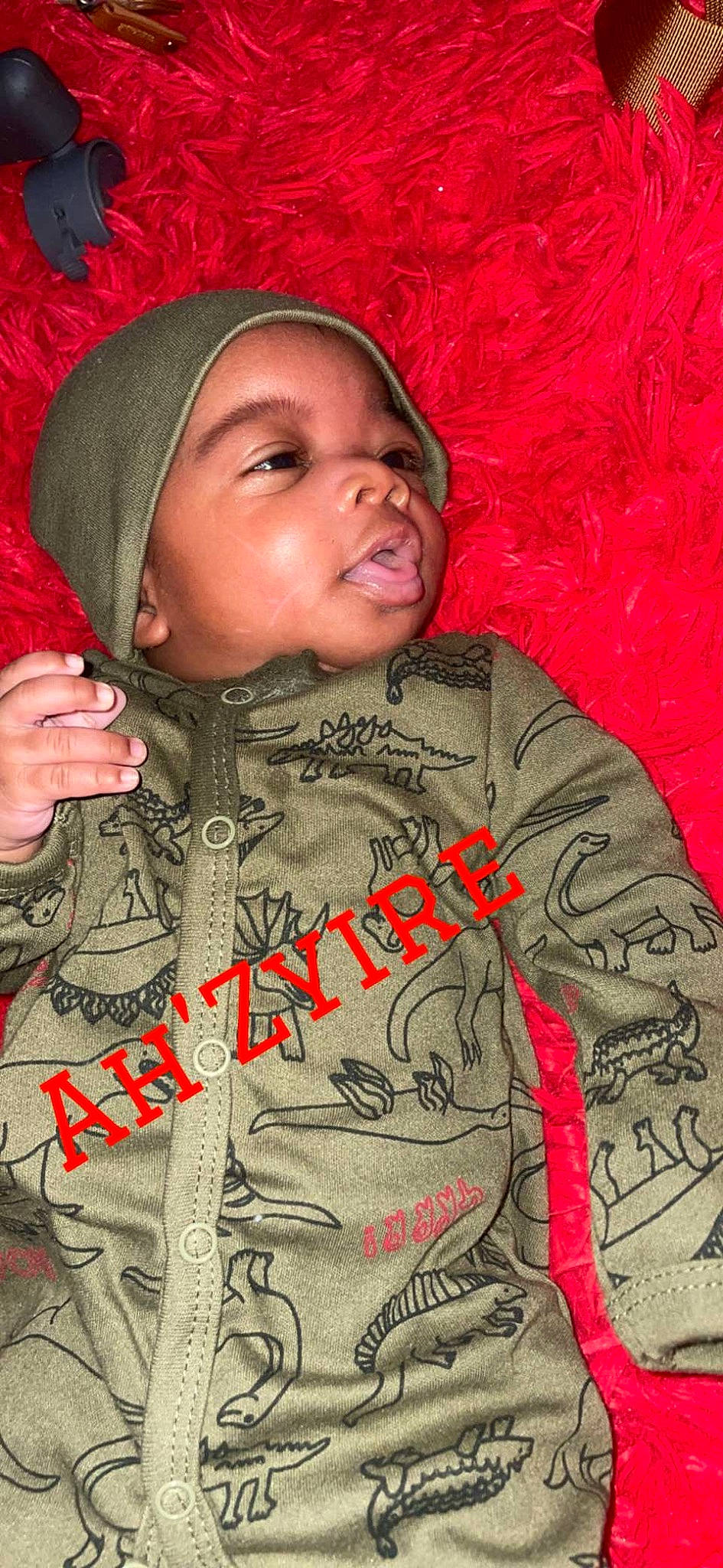 Ah Zyire is registered to the contest to win money with this photo: adaptation, art, baby, cap, cheek, child, chin, cool, facial_expression, font, happy, headwear, human, illustration, pattern, person, photo_caption, poster, sleeve, textile