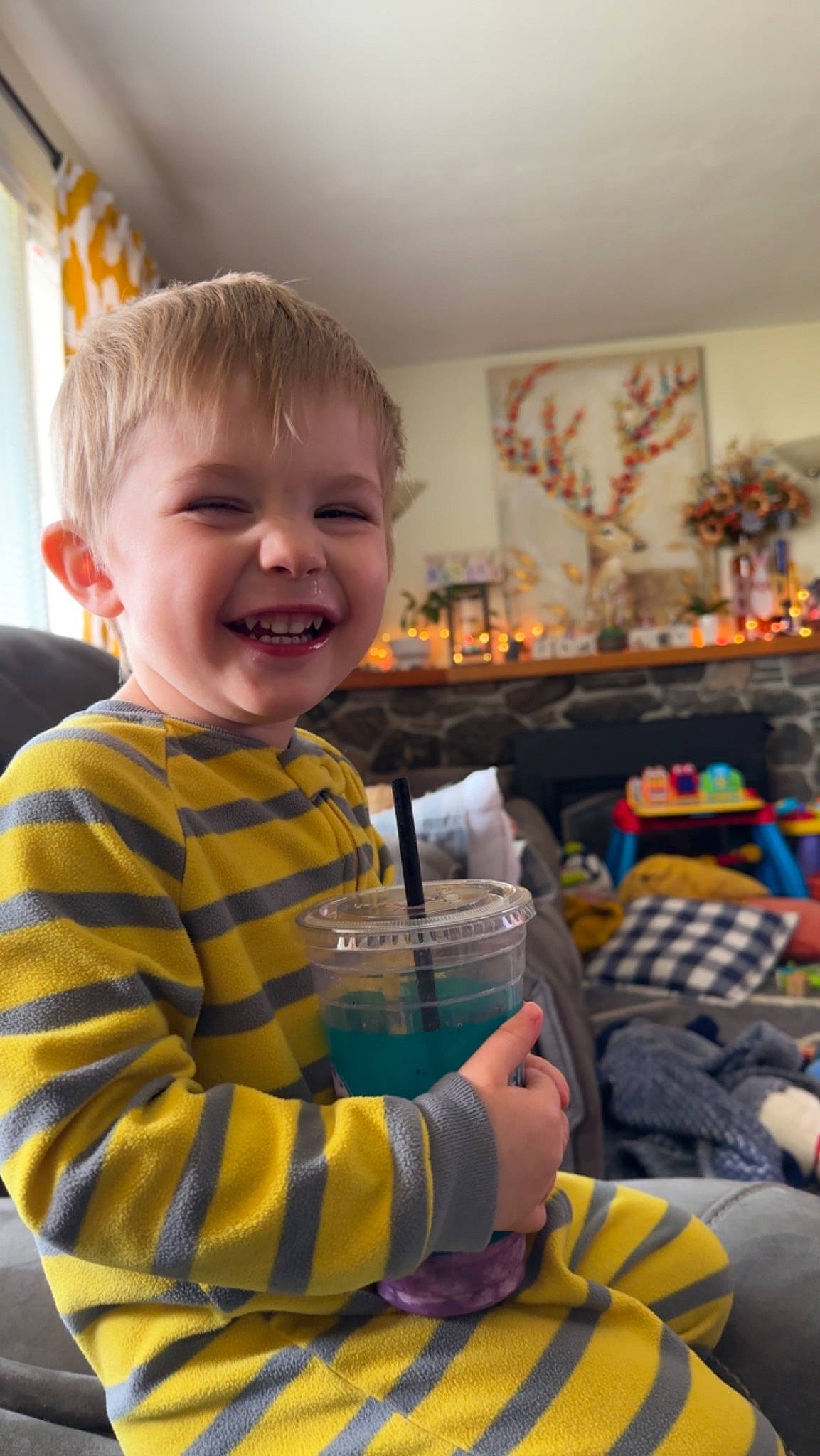 Kai is registered to the contest to win money with this photo: baby, baby_products, baby_toddler_clothing, cheek, child, event, fun, happy, holiday, iris, joy, laugh, person, play, room, sitting, smile, t_shirt, toddler, toy