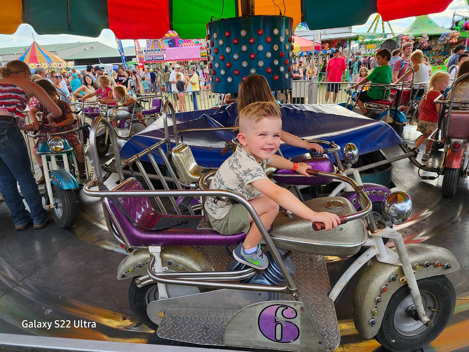 Kai joined the competition — help win amazing prizes! auto_part, automotive_design, automotive_exterior, automotive_tire, automotive_wheel_system, child, city, classic, event, fender, fun, joy, leisure, motor_vehicle, person, recreation, rim, spoke, tire, toddler