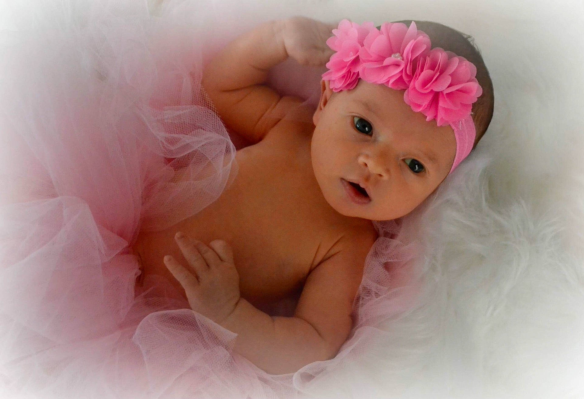 Ainslie is registered to the contest to win money with this photo: cheek, child, girl, hair_accessory, infant, iris, person, pink, product, skin, toddler