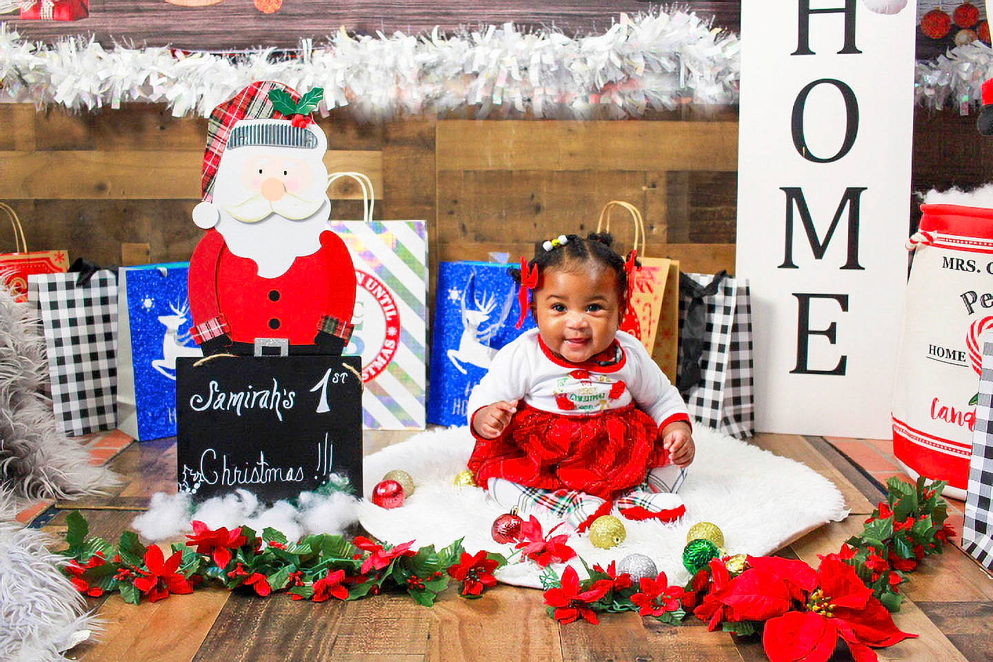 Samirah joined the competition — help win amazing prizes! baby, child, christmas, christmas_decoration, christmas_eve, event, floral_design, font, happy, hat, holiday, person, petal, red, santa_claus, smile, snapshot, toddler, tradition, white