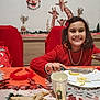 Maina participe au concours pour gagner de l'argent avec cette photo : child, children, holiday, christmas, red_clothing, festive, smile, dining_table, food, plate, cutlery, decorations, giraffe_wall_art, reindeer_figurines, tablecloth, napkin, candle, pearl_necklace, headband, happy