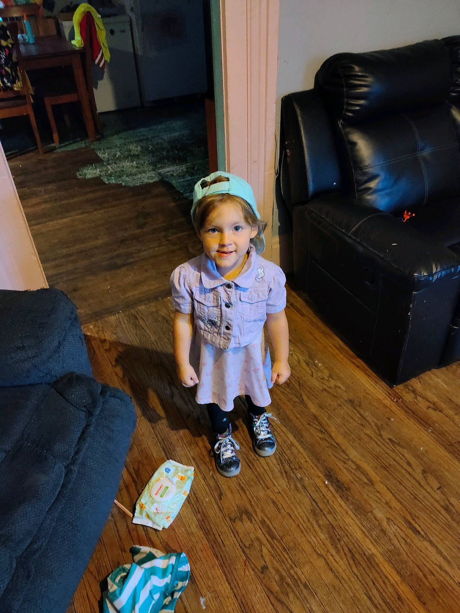 Kambria is registered to the contest to win money with this photo: baby_toddler_clothing, chair, child, club_chair, comfort, floor, flooring, fun, happy, hardwood, laminate_flooring, living_room, luggage_and_bags, person, sitting, smile, toddler, varnish, wood, wood_flooring