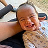Nayeli is registered to the contest to win money with this photo: baby, smiling, laughing, child, infant, face, hair, clothing, onesie, person, happy, outdoor, arm, skin, expression, human, cute, joy, toddler, natural_light