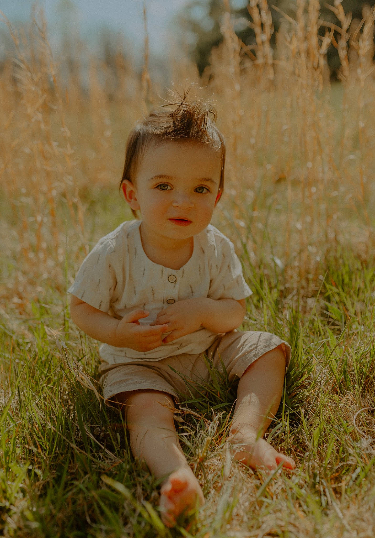 Camdyn joined the competition — help win amazing prizes! baby, baby_toddler_clothing, child, eye, field, fun, grass, grass_family, grassland, happy, meadow, people_in_nature, person, plant, portrait_photography, prairie, sitting, smile, spring, sunlight