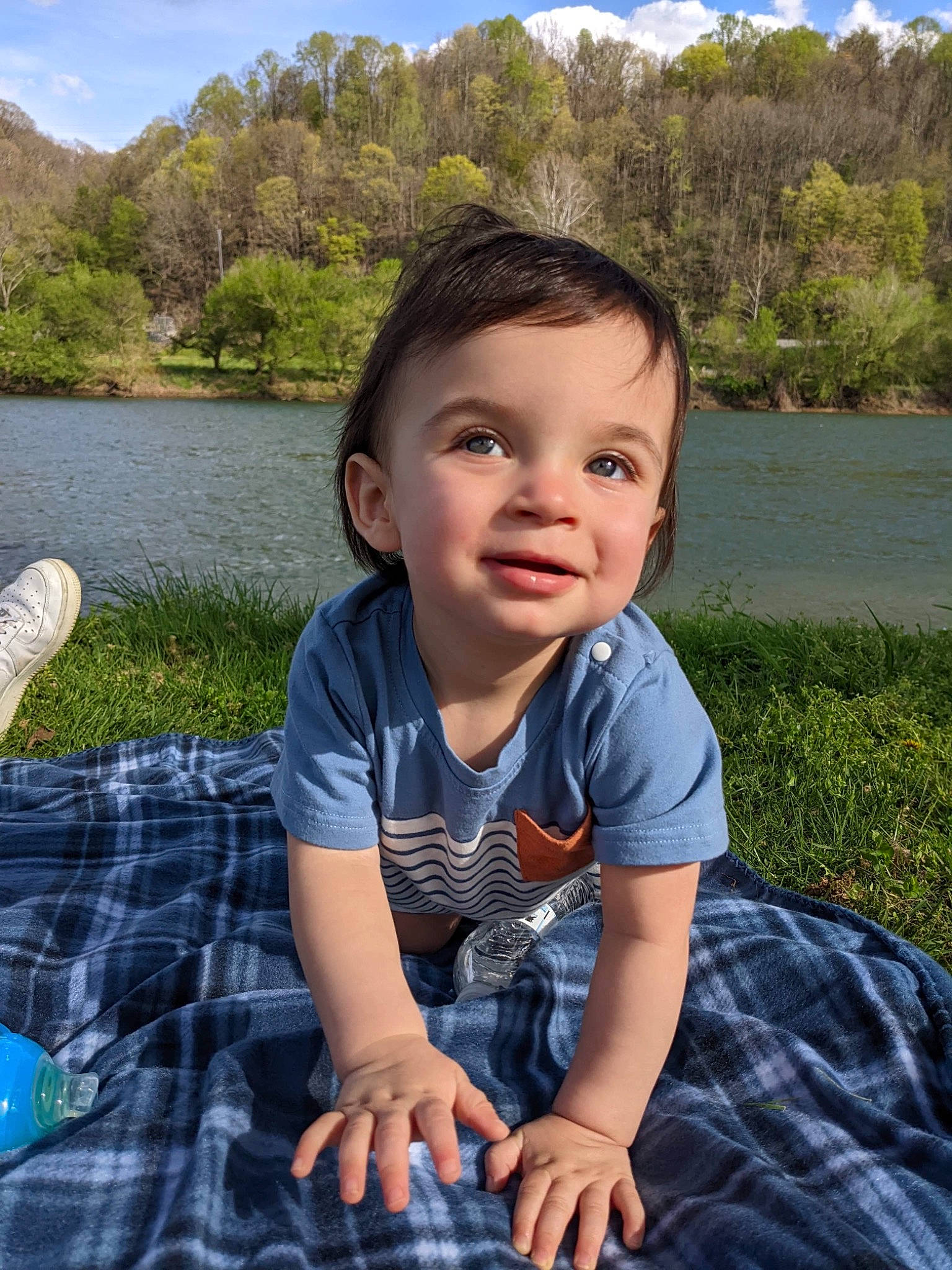 Camdyn is registered to the contest to win money with this photo: azure, baby_toddler_clothing, blue, cloud, eye, fun, grass, green, hairstyle, happy, joy, leaf, leisure, mountain, nature, people_in_nature, person, plant, sky, summer