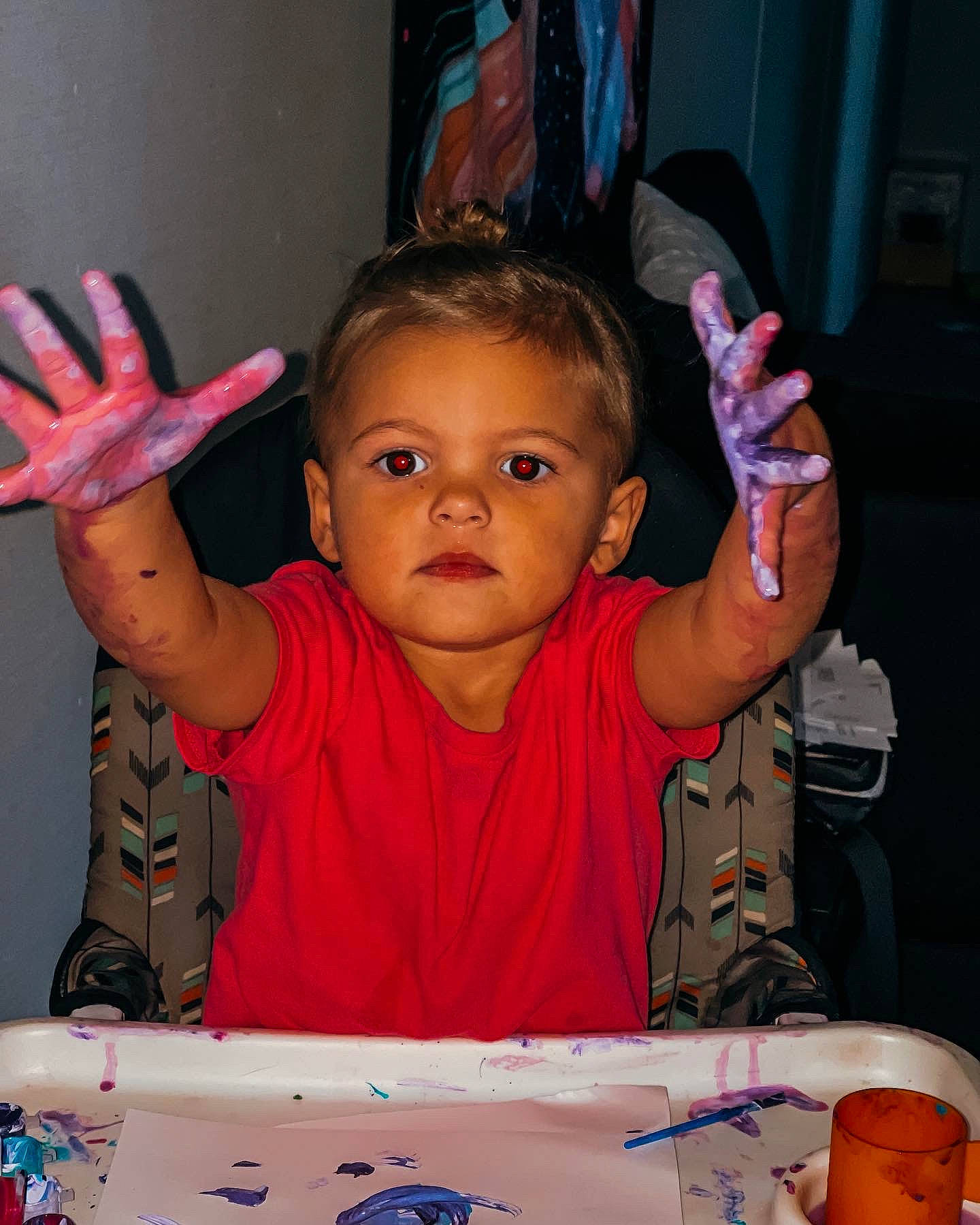 Novalyn is registered to the contest to win money with this photo: birthday, chair, cheek, child, desk, event, eyelash, facial_expression, finger, fun, gesture, hand, happy, organ, people, person, pink, t_shirt, table, thumb