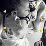 Cameron is registered to the contest to win money with this photo: baby, sleeping, blanket, cozy, infant, black_and_white, heart_overlay, cute, child, peaceful, indoors, soft_texture, clothing, portrait, resting, newborn, adorable, toddler, sweet, warm