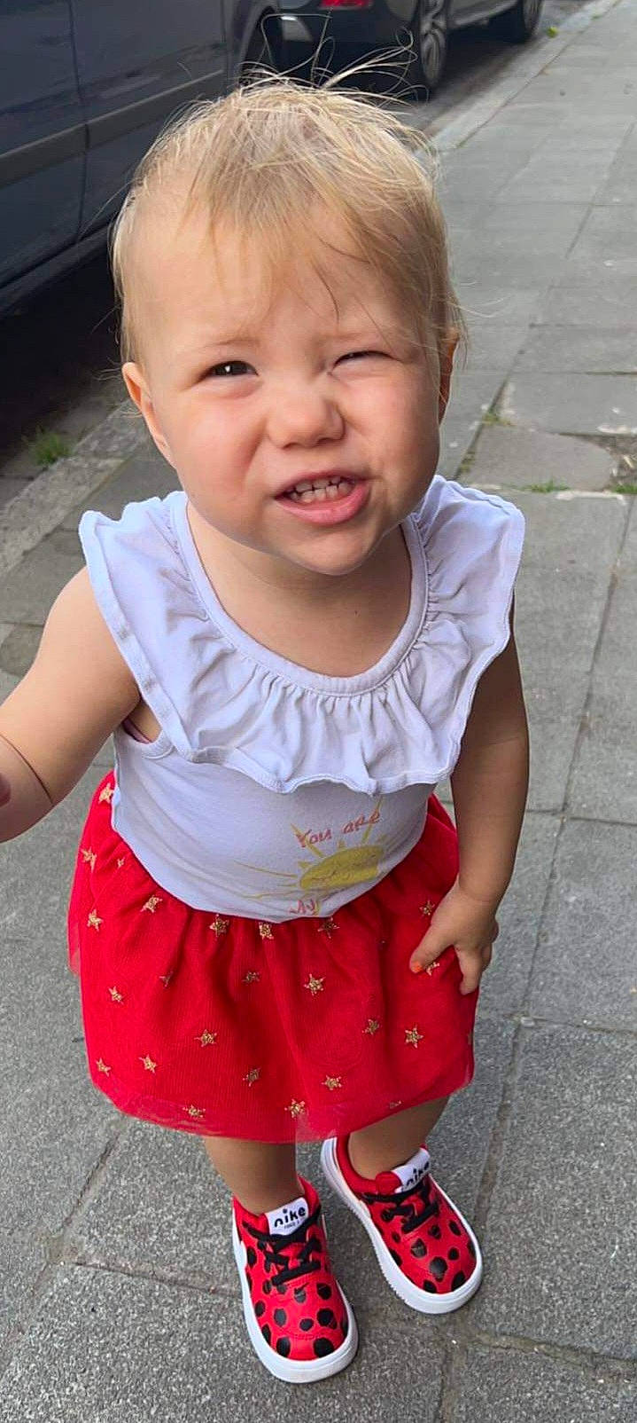 Hope participe au concours pour gagner de l'argent avec cette photo : baby_toddler_clothing, cheek, chin, dress, eye, face, hair, head, human_body, joint, lip, mouth, neck, nose, organ, person, photograph, shoulder, skin, sleeve