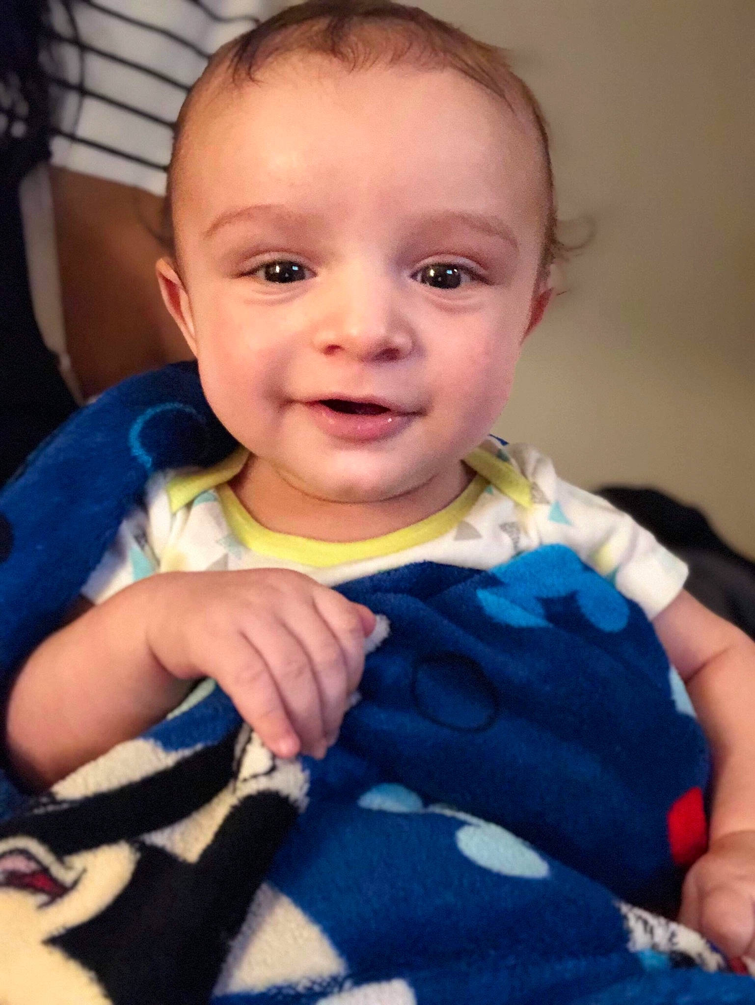 Izayah is registered to the contest to win money with this photo: baby, cheek, child, eye, face, finger, head, lip, nose, person, skin, smile, thumb, toddler